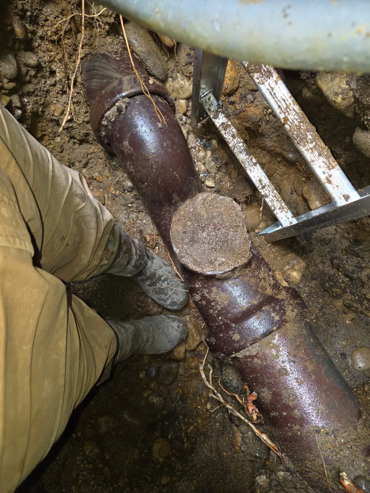 Cast iron house trap exposed during a Milwaukee sewer excavation